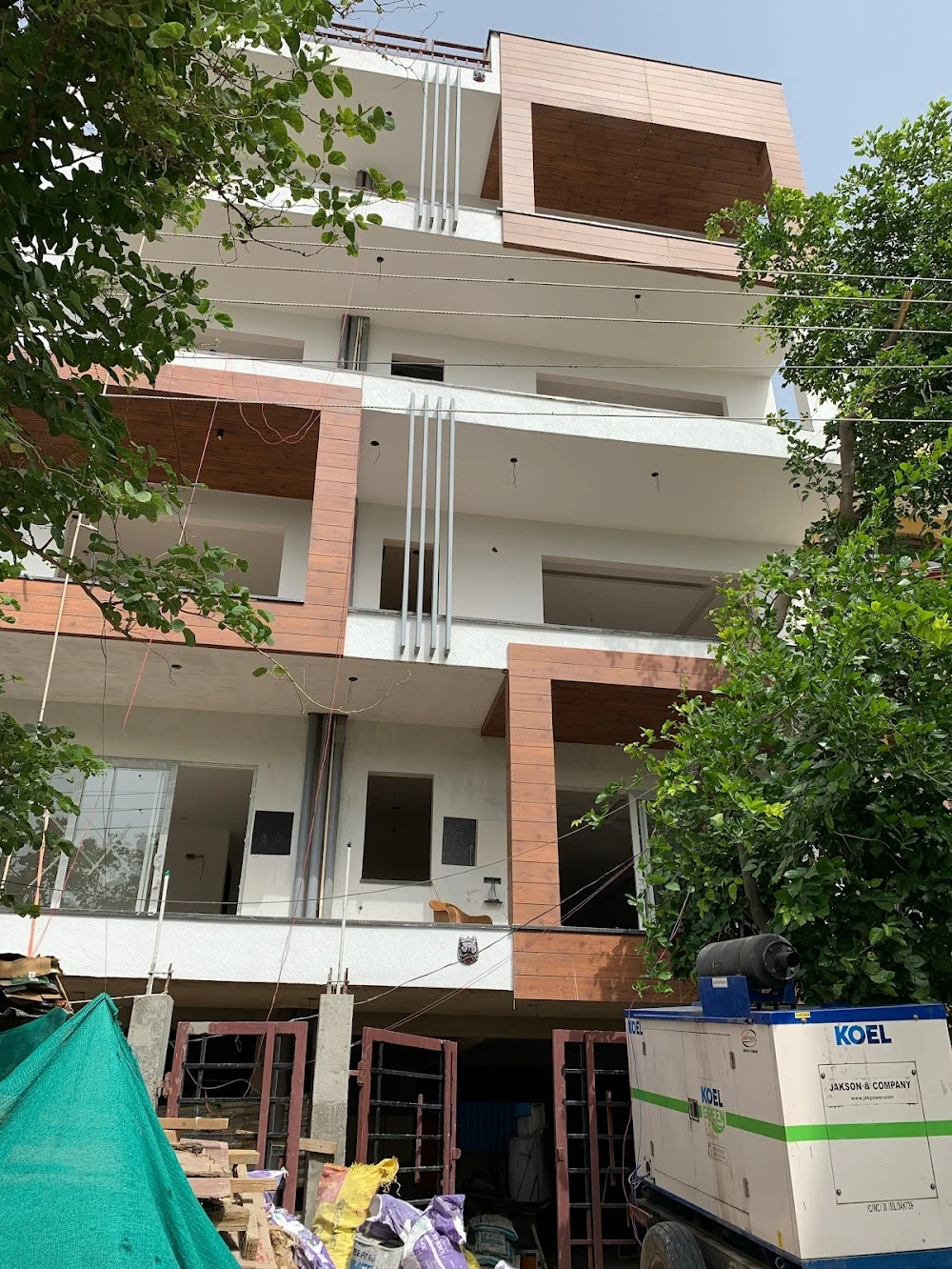 Stilt plus 4 floors residential building construction Delhi NCR — builder floor architecture